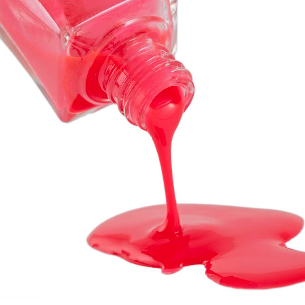 istock Red Nail Polish Closeup isolated on the white background 1148334050