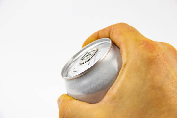istock Aluminum can for drinks in the hands of man 1148334155