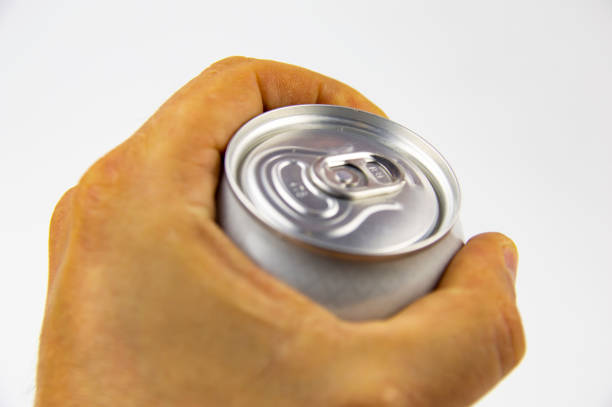 istock Aluminum can for drinks in the hands of man 1148334159