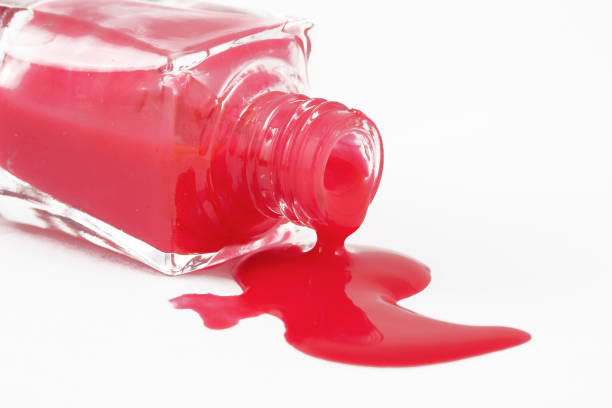 istock Red Nail Polish Closeup isolated on the white background 1148334342