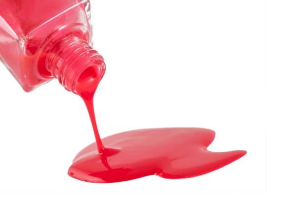 istock Red Nail Polish Closeup isolated on the white background 1148334348