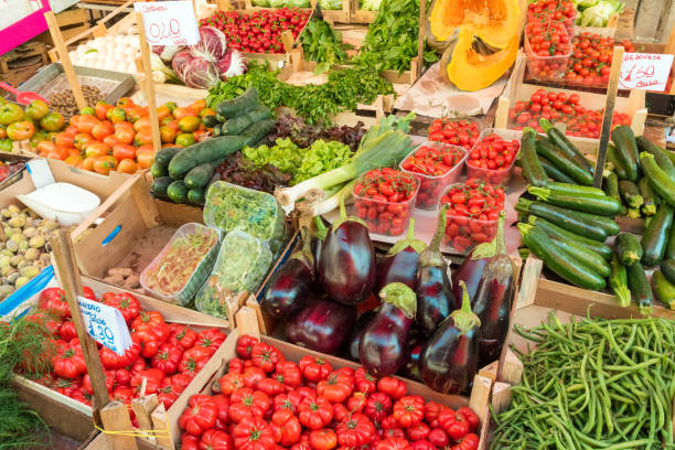 istock Fresh vegetables and salad for sale 1148334370