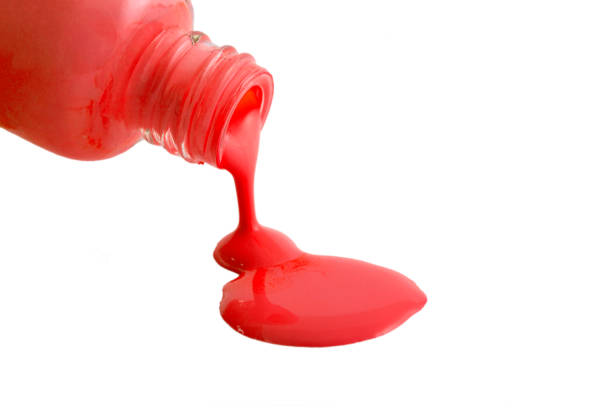 istock Red Nail Polish Closeup isolated on the white background 1148334378