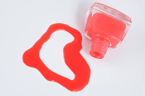 istock Red Nail Polish Closeup isolated on the white background 1148335104