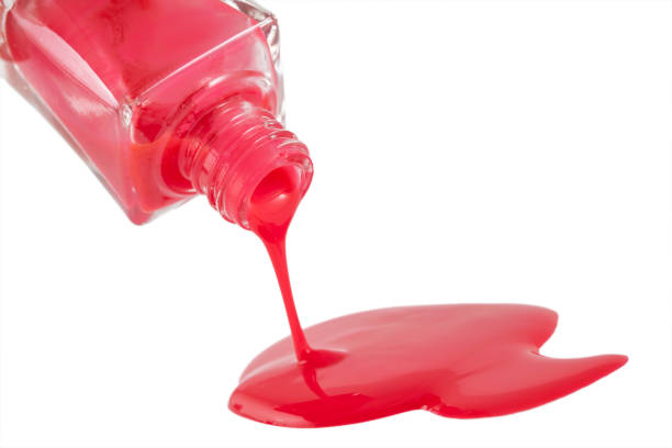 istock Red Nail Polish Closeup isolated on the white background 1148335170