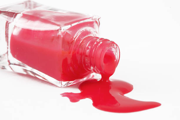 istock Red Nail Polish Closeup isolated on the white background 1148335177