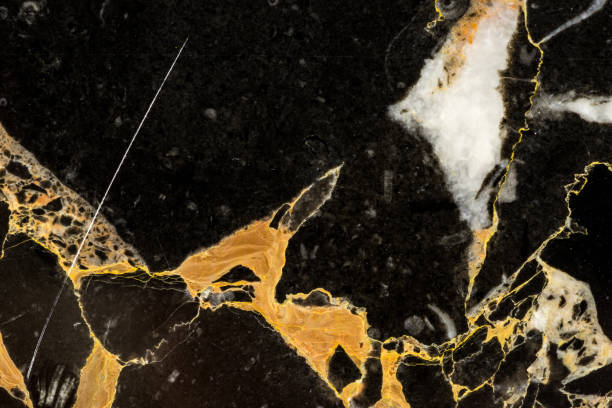 texture of golden black marble pattern slab natural for interior design background texture of golden black marble pattern slab natural for interior design background veining stock pictures, royalty-free photos & images