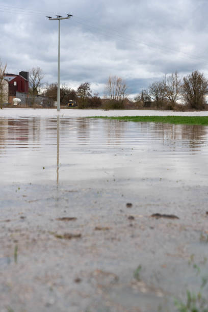 istock High water of a small river on the fields in spring 1148341974