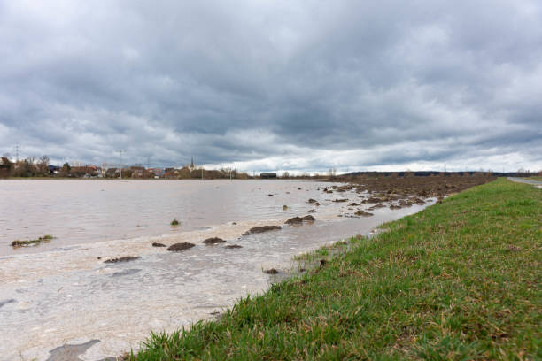 istock High water of a small river on the fields in spring 1148342000