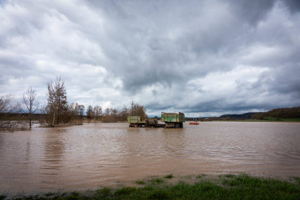 istock Farm machinery on a flooded field 1148342053
