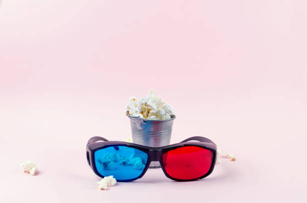 istock popcorn in a bucket on pink background 1148342804