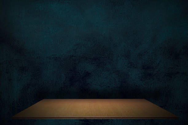 istock Empty plank wood shelf at blue and black wall product background, Mock up for display or montage of product or design