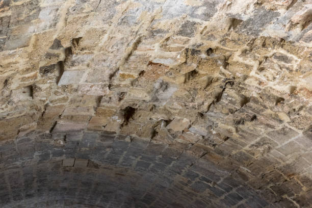 istock vault of an ancient stone arch 1148347109