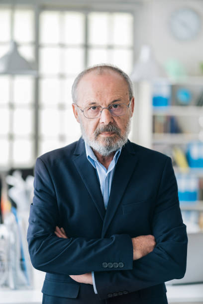 istock Confident senior businessman leader at office 1148355000