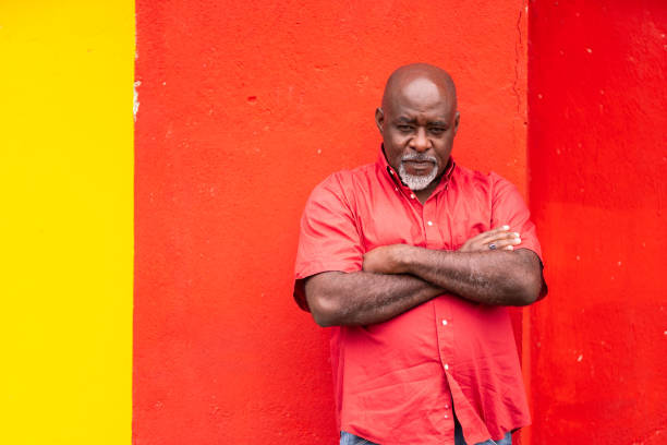 istock Mature afro man portrait on colorful background 1148355018