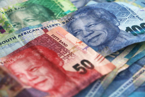 South African Rands notes stacked South African money stacked to show Mandelas face and communicate wealth and finances african currency stock pictures, royalty-free photos & images