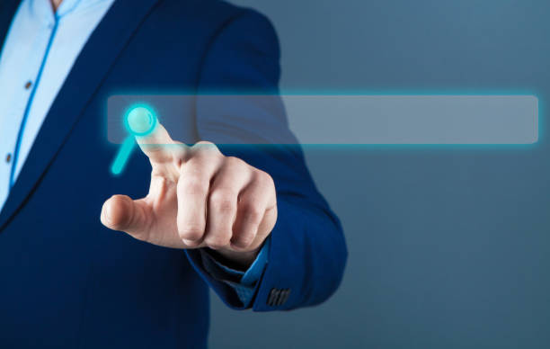 istock businessman on a dark background, touchscreen; web search 1148355213