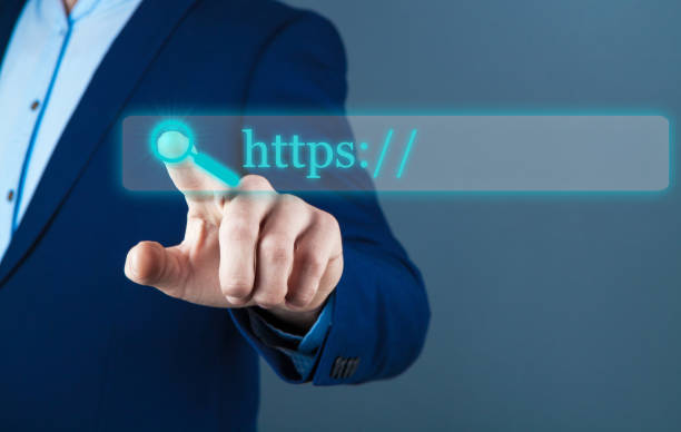istock businessman on a dark background, touchscreen; web search 1148355220