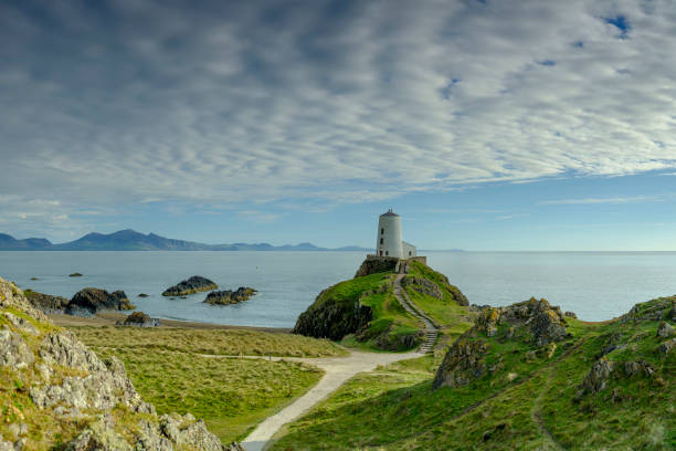 istock Evening light on Twr Mawr Light House on Llanddwyn Island, Anglesey, UK 1148364876