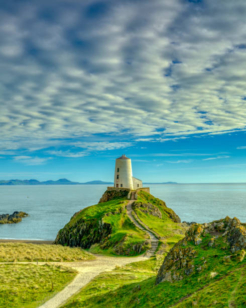 Twr Mar Lighthouse on Llanddwyn Island off Anglesey, Wales UK
