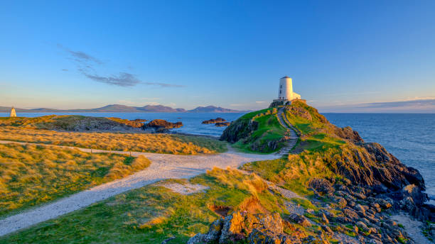 istock Twr Mar Lighthouse on Llanddwyn Island off Anglesey, Wales UK 1148365576