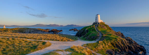 istock Evening light on Twr Mawr Light House on Llanddwyn Island, Anglesey, UK 1148365594