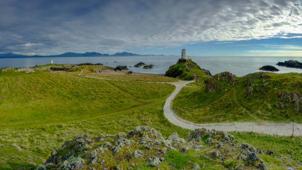 istock Evening light on Twr Mawr Light House on Llanddwyn Island, Anglesey, UK 1148365600