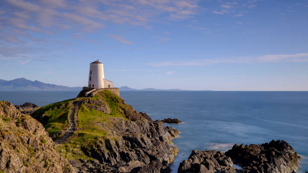istock Evening light on Twr Mawr Light House on Llanddwyn Island, Anglesey, UK 1148365602