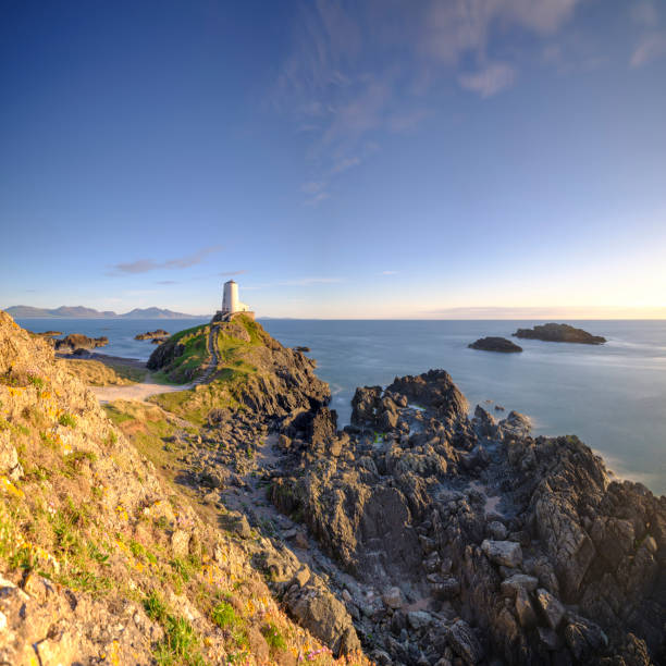istock Evening light on Twr Mawr Light House on Llanddwyn Island, Anglesey, UK 1148365617