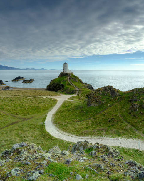 istock Evening light on Twr Mawr Light House on Llanddwyn Island, Anglesey, UK 1148365644