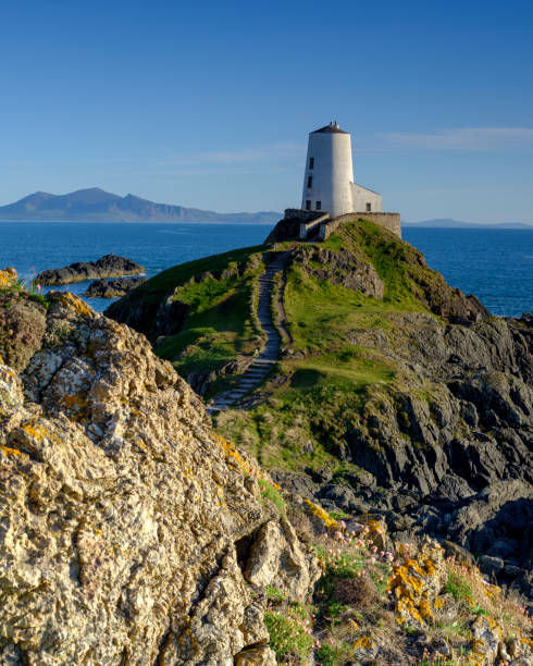 istock Evening light on Twr Mawr Light House on Llanddwyn Island, Anglesey, UK 1148365645