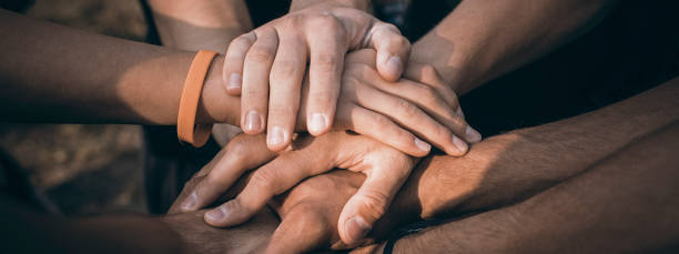 istock Teamwork Join Hands Support Together Concept. Sports People Joining Hands. 1148365962