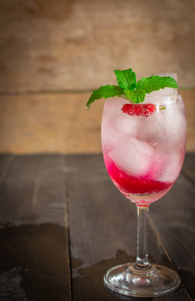 istock Fresh Ice Mulberry Soda drink on the wood table. 1148369685