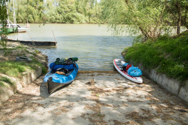 istock folding kayak and sup ready for expedition are standing near a berth 1148370925