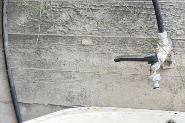istock Old faucet in an abandoned factory 1148377433