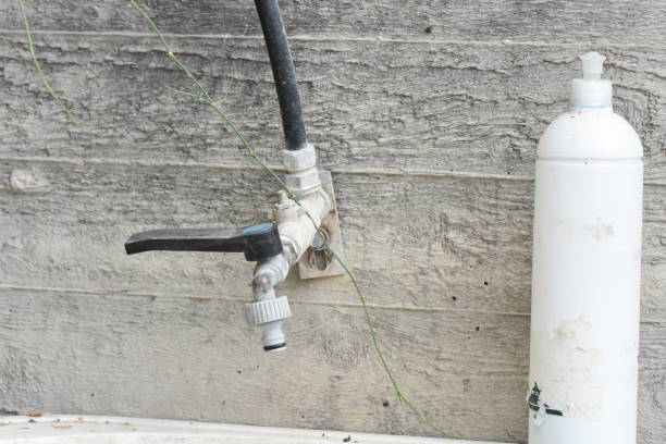 istock Old faucet in an abandoned factory 1148377435
