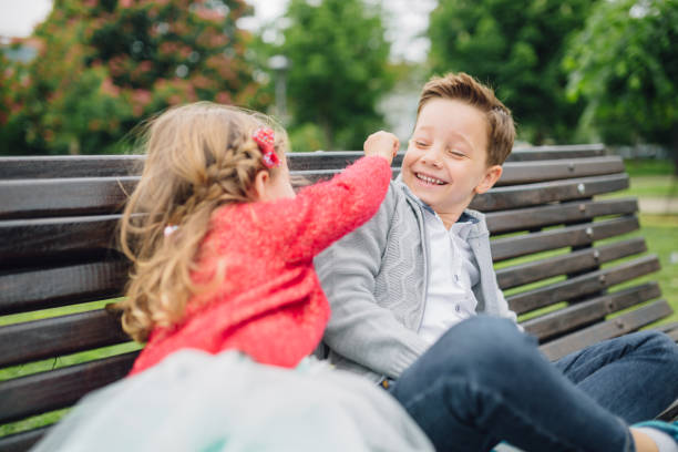 istock Children playing in the park 1148381343