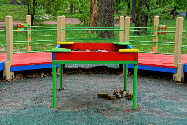 istock colored children table stands on the ground on the playground 1148382182