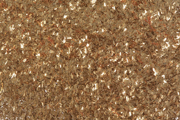 istock Golden glitter texture, abstract background. Bright exclusive texture, pattern. Low contrast photo. 1148387699