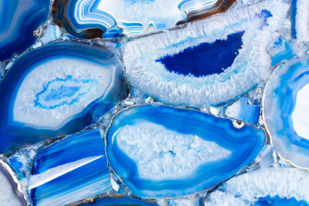Spectacular expensive agat texture in contrast blue surface. Spectacular expensive agat texture in contrast blue surface. High resolution photo. geode photos stock pictures, royalty-free photos & images