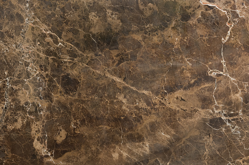 Natural marble texture in brown colour. High resolution photo.