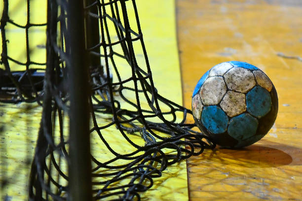 istock Handball ball and the net from the goal 1148391204