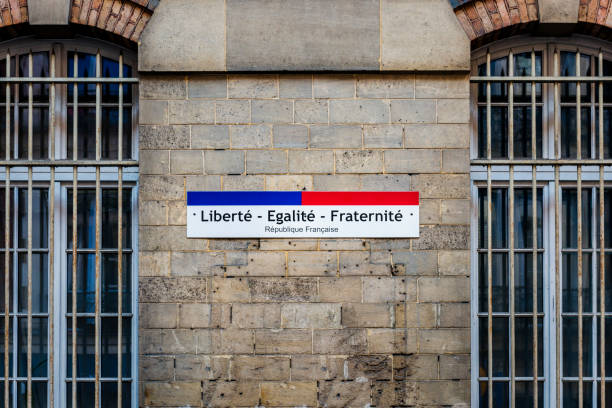 sign liberte, egalite, fraternite - in english freedom, equality, fraternity sign freedom equality fraternite motto stock pictures, royalty-free photos & images