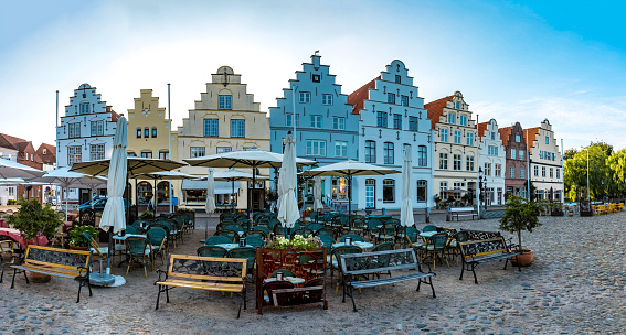 Nordic houses and facades on the market square in Friedrichstadt