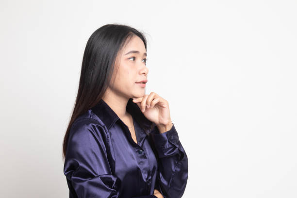 istock Serious  young Asian woman  look away. 1148393936