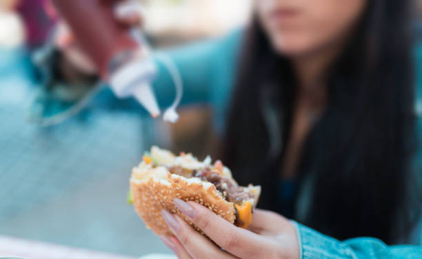 Girl Eating a Hamburger