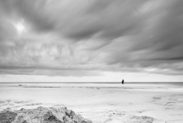 istock Fisherman in storm dramatic sea 1148396510