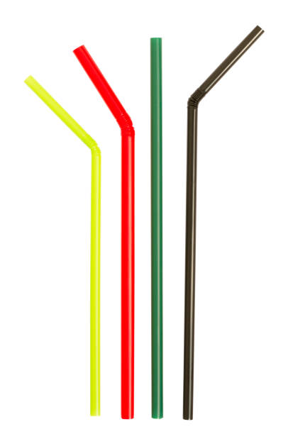 istock Multi-colored straws arragment in glass shaped isolated on white background 1148397987
