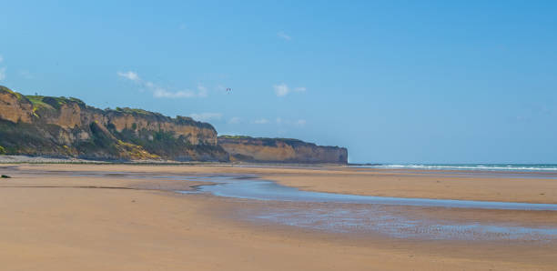istock view of Omaha beach 1148399263