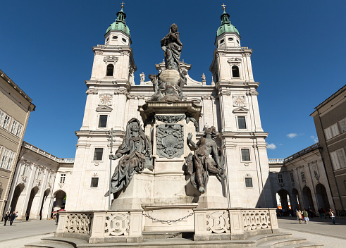 Salzburg, Austria - April 29; 2016: Cathedral of Saints Rupert and Vergilius and Marian column in Domplatz. Salzburg,  Austria